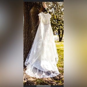 Size 22 wedding dress! Beautiful lace and pearl beading.